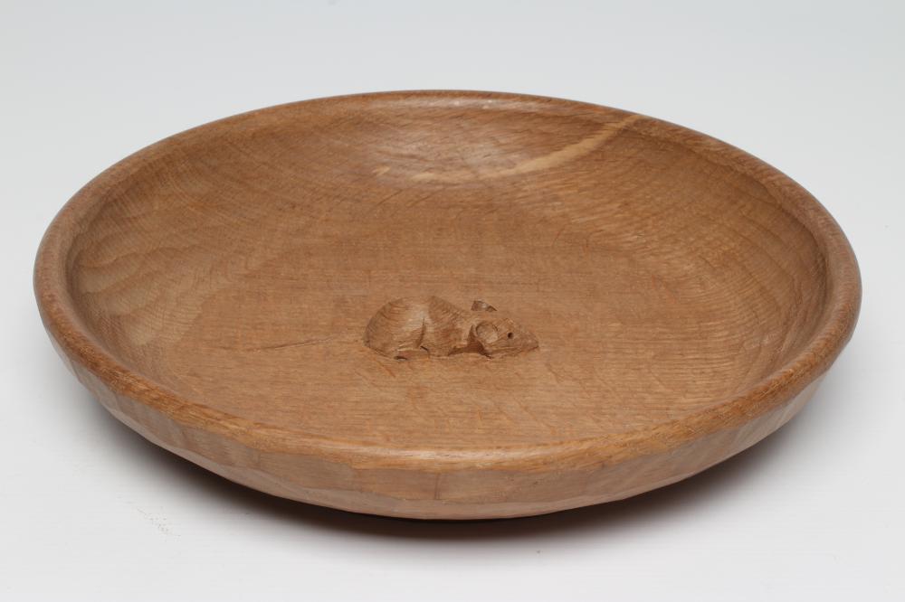 A ROBERT THOMPSON ADZED OAK FRUIT BOWL of shallow circular form with carved mouse trademark in high Image