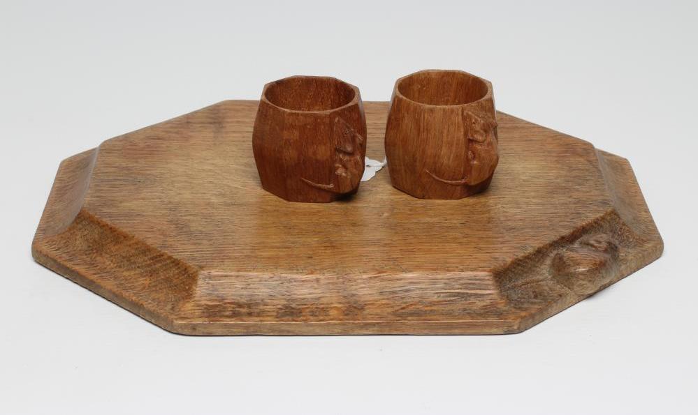 A ROBERT THOMPSON OAK BREAD BOARD of canted oblong form Image