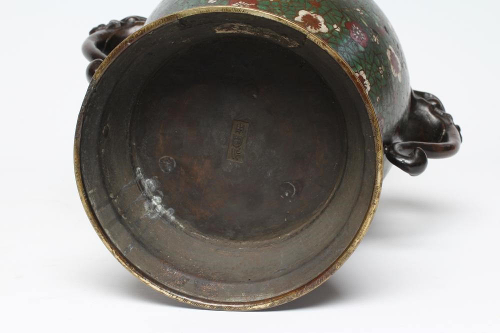 A CHINESE CLOISONNE ENAMEL VASE AND COVER of inverted baluster form with mask scroll handles Image