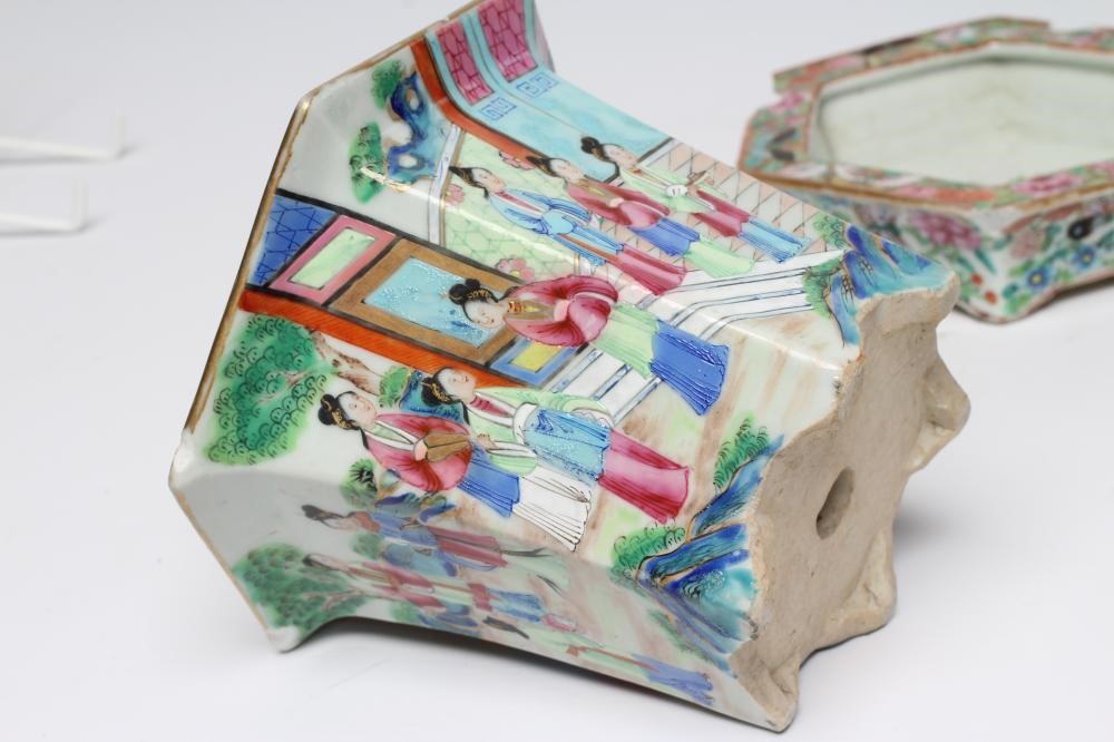 A PAIR OF CANTONESE PORCELAIN FAMILLE ROSE HEXAGONAL CACHE-POTS AND STANDS painted with a continous Image