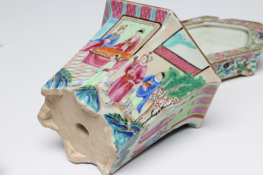A PAIR OF CANTONESE PORCELAIN FAMILLE ROSE HEXAGONAL CACHE-POTS AND STANDS painted with a continous Image