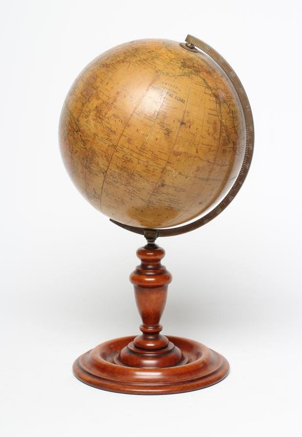 A PHILIPS 10" TERRESTRIAL TABLE GLOBE, early 20th century, raised on turned fruitwood stand (Est. Image