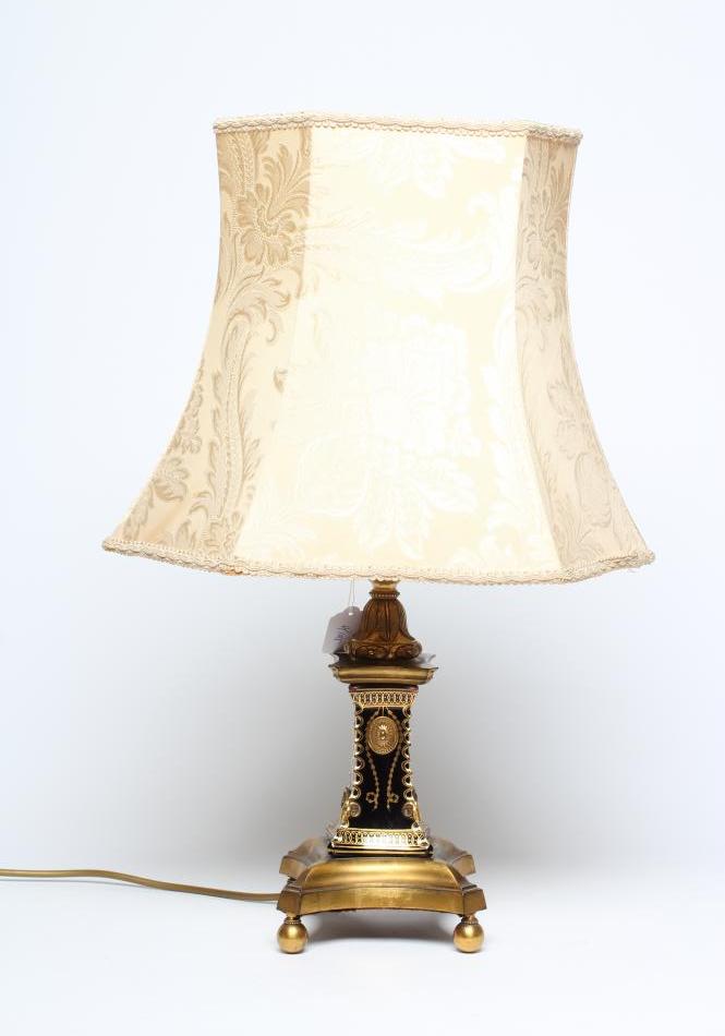 A FRENCH GILDED BRASS AND GLASS TABLE LAMP Image