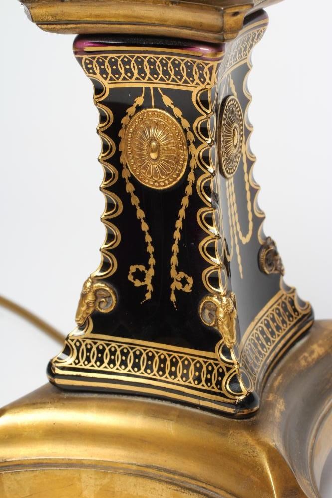 A FRENCH GILDED BRASS AND GLASS TABLE LAMP Image