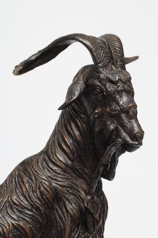 AFTER PIERRE-JULES MENE (French 1810-1879) a bronze mountain goat on a rocky outcrop, signed to Image