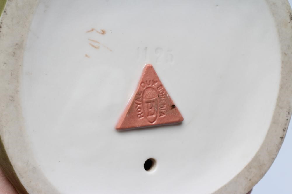 ROYAL DUX PORCELAIN ART NOUVEAU FIGURAL CENTREPIECE modelled as a young maiden standing between a Image