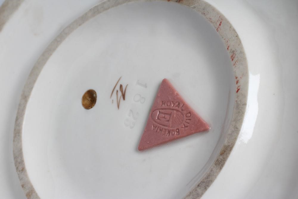 A ROYAL DUX PORCELAIN ART NOUVEAU FIGURAL CENTREPIECE modelled as two young maidens holding aloft a Image