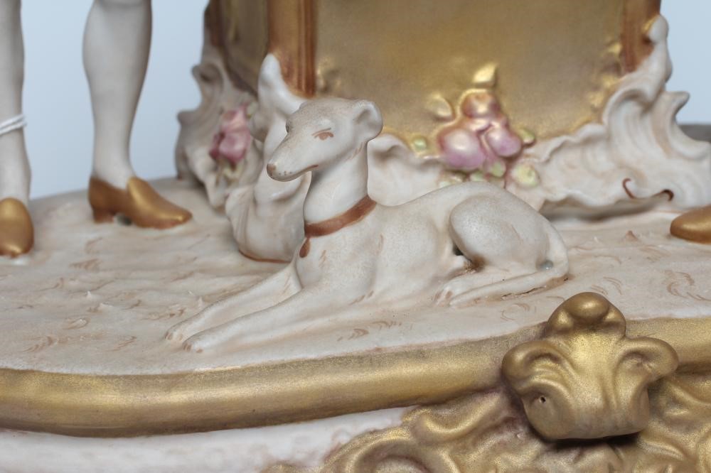 A ROYAL DUX PORCELAIN FIGURAL GROUP Image