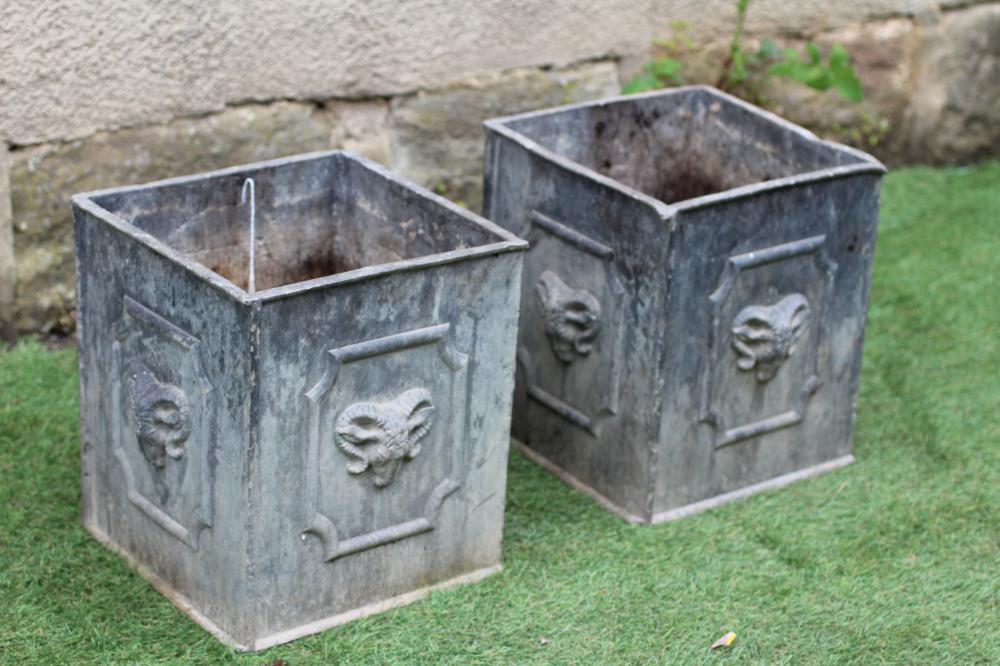 A PAIR OF SQUARE LEAD PLANTERS, the sides with ram's heads within cut cornered panels, 10 1/4" x 12" Image