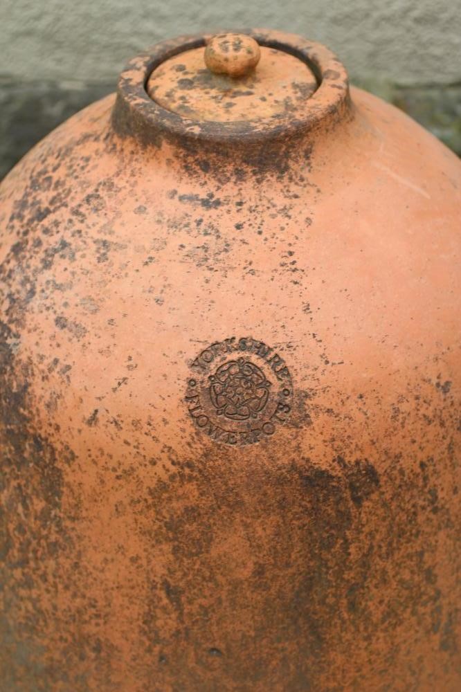 A TERRACOTTA RHUBARB FORCER manufactured by Yorkshire Flowerpots, of usual bell form, the detachable Image