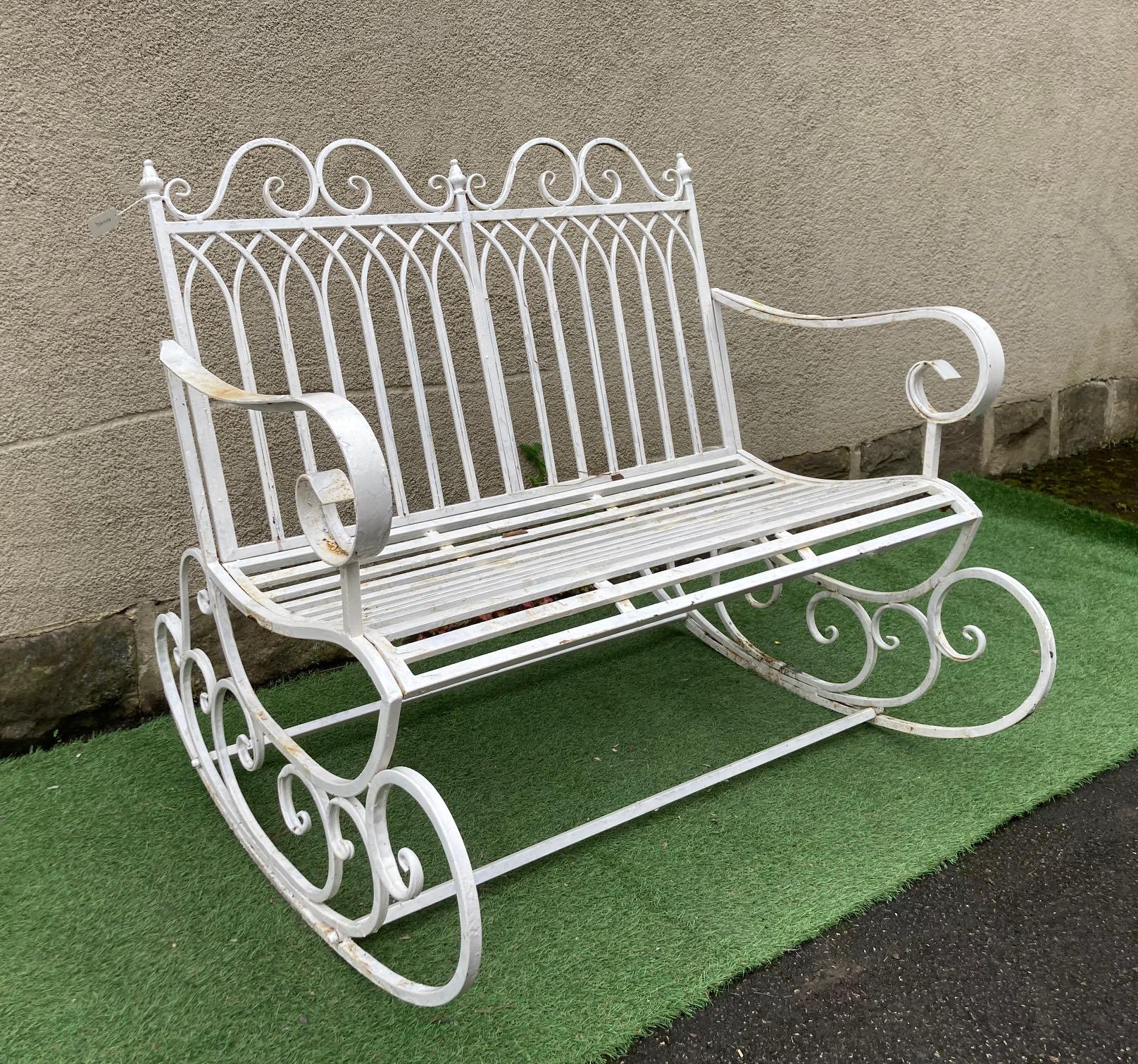 A CAST IRON ROCKING LOVE SEAT to match previous lot, 42 1/2" wide (Est. plus 24% premium inc. VAT) Image