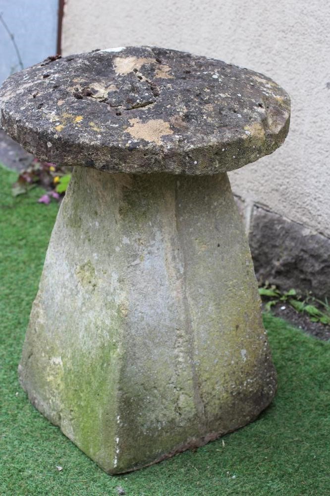 A PAIR OF SANDSTONE STADDLE STONES with mushroom caps on square tapering bases, 22" x 30" Image