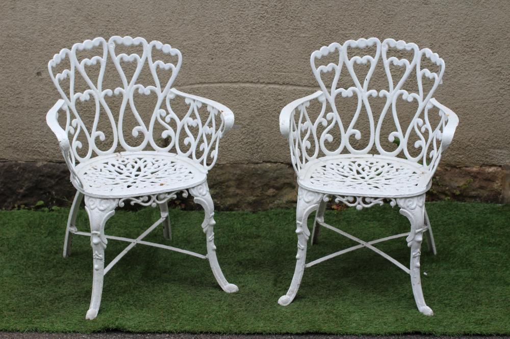 A PAIR OF CAST IRON CHAIRS Image