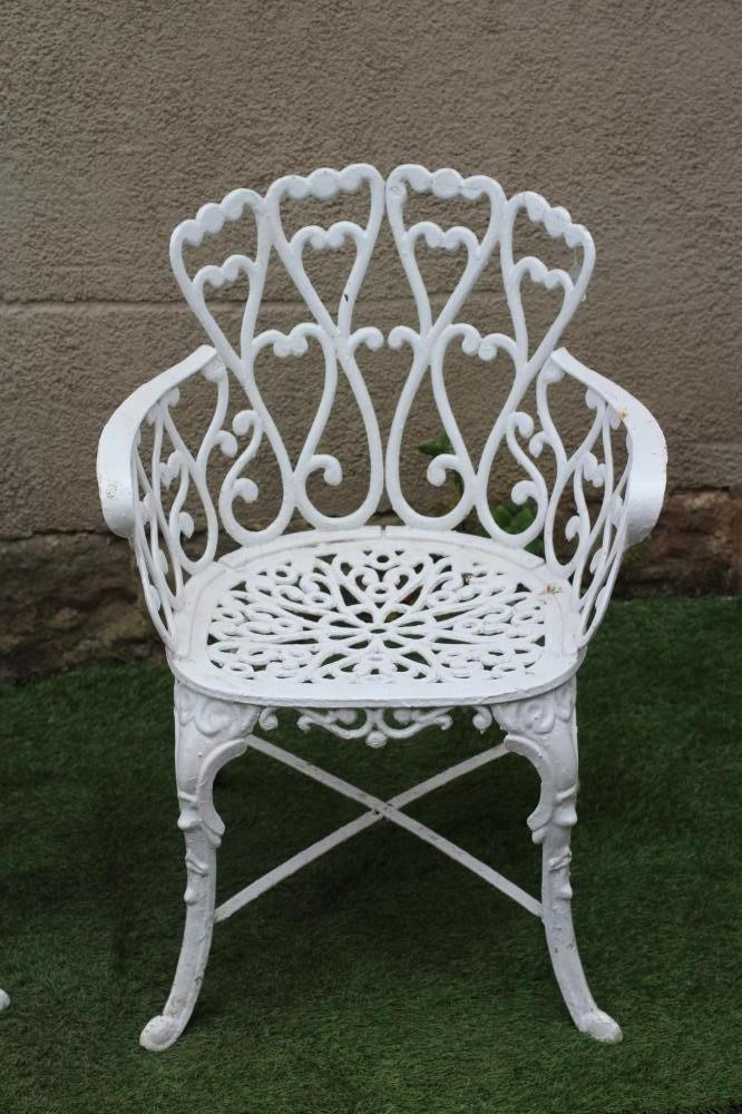 A PAIR OF CAST IRON CHAIRS Image