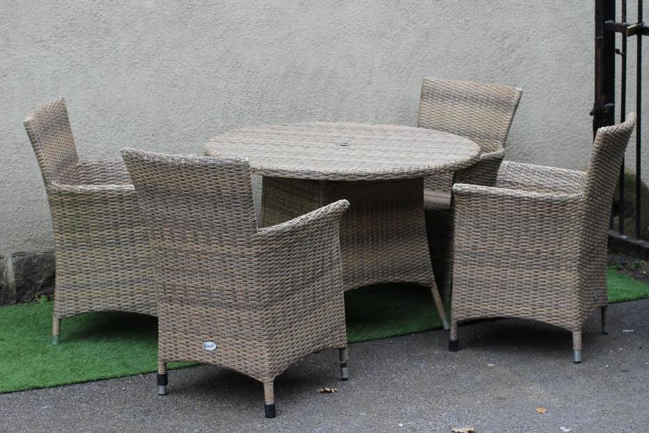 A HARTMAN RESIN WEAVE DINING SUITE, comprising a circular table on splayed aluminium tubular legs, Image