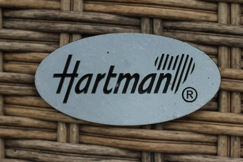 A HARTMAN RESIN WEAVE DINING SUITE, comprising a circular table on splayed aluminium tubular legs, Image