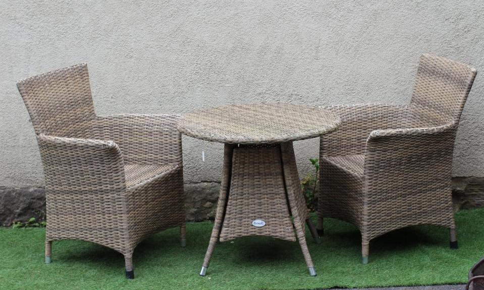 A HARTMAN RESIN WEAVE DINING SUITE, comprising a circular table on splayed aluminium tubular legs, Image