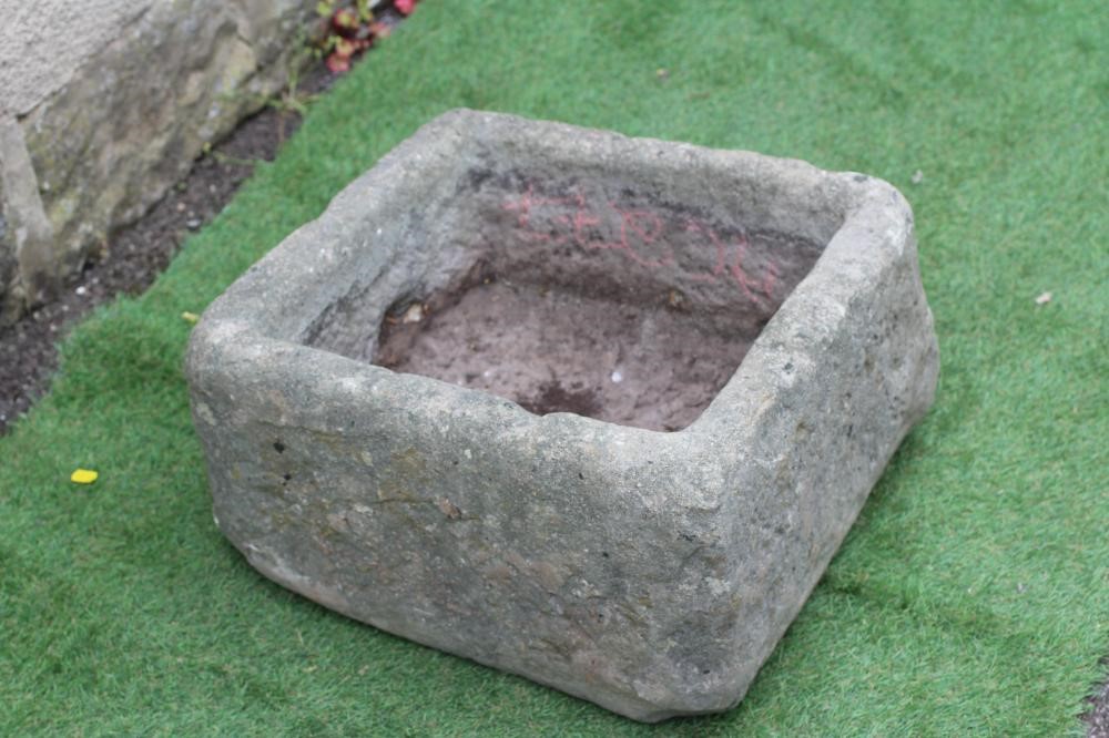 A SANDSTONE TROUGH of rough hewn square form, 20" x 19" x 10" (Est. plus 24% premium inc. VAT) Image