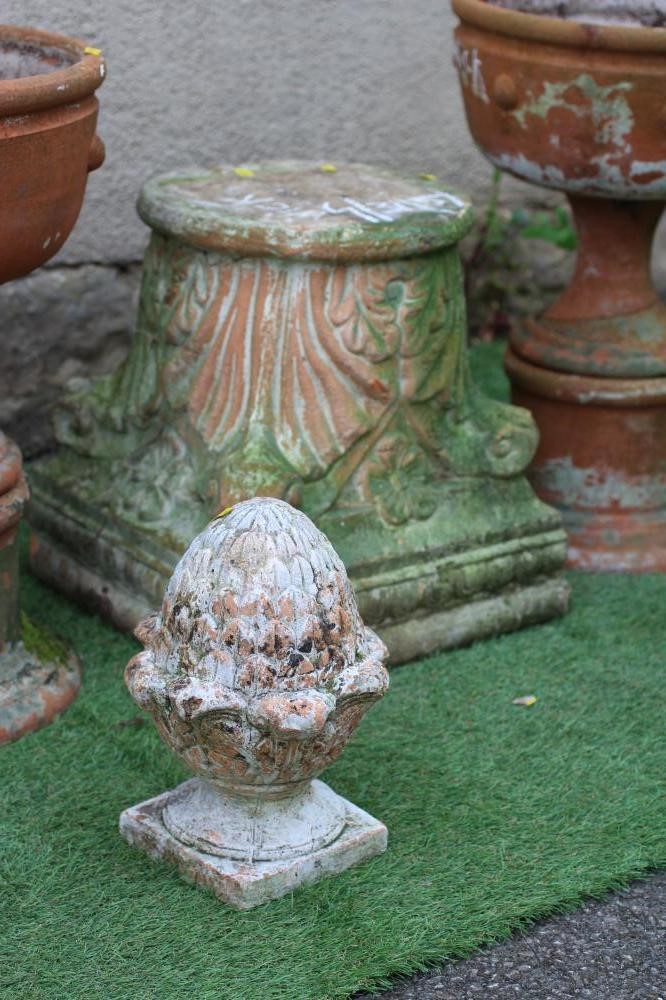 A PAIR OF TERRACOTTA URNS of plain circular form Image