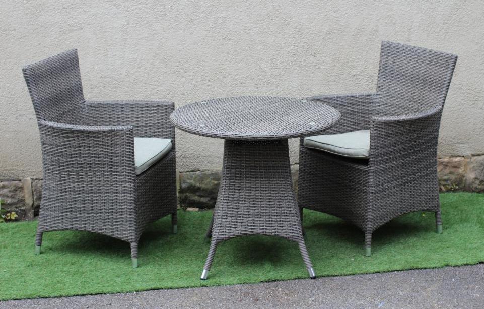 A HARTMAN RESIN WEAVE DINING SUITE Image