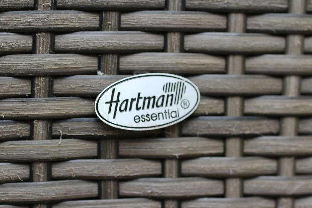 A HARTMAN RESIN WEAVE DINING SUITE Image