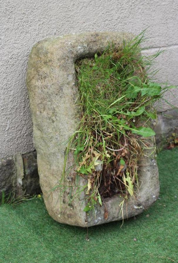 A SANDSTONE TROUGH of rough hewn oblong form, 25 1/2" x 15" x 9" (Est. plus 24% premium inc. VAT) Image