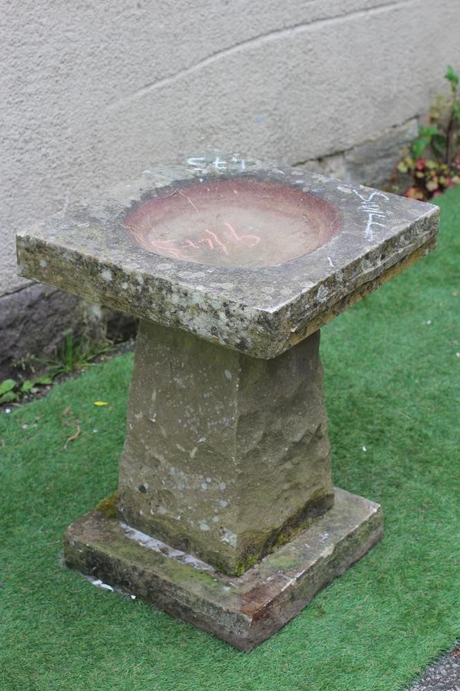 A SANDSTONE BIRD BATH of square form with tapering stem, 18" x 25" (Est. plus 24% premium inc. VAT) Image