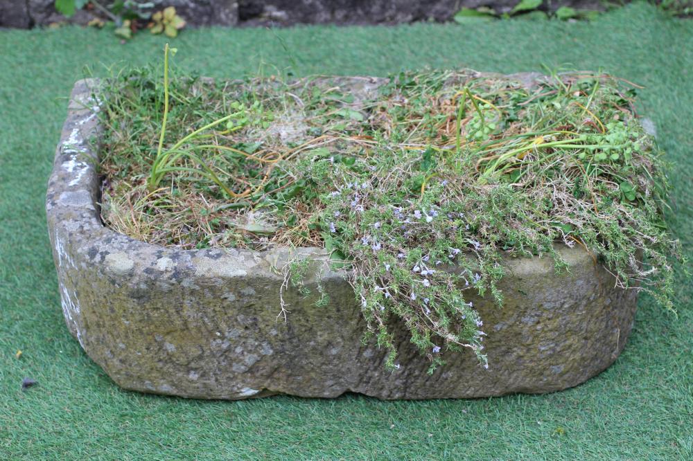 A SANDSTONE TROUGH of well cut D form with central division, 29" x 17" x 8 3/4" (Est. plus 24% Image