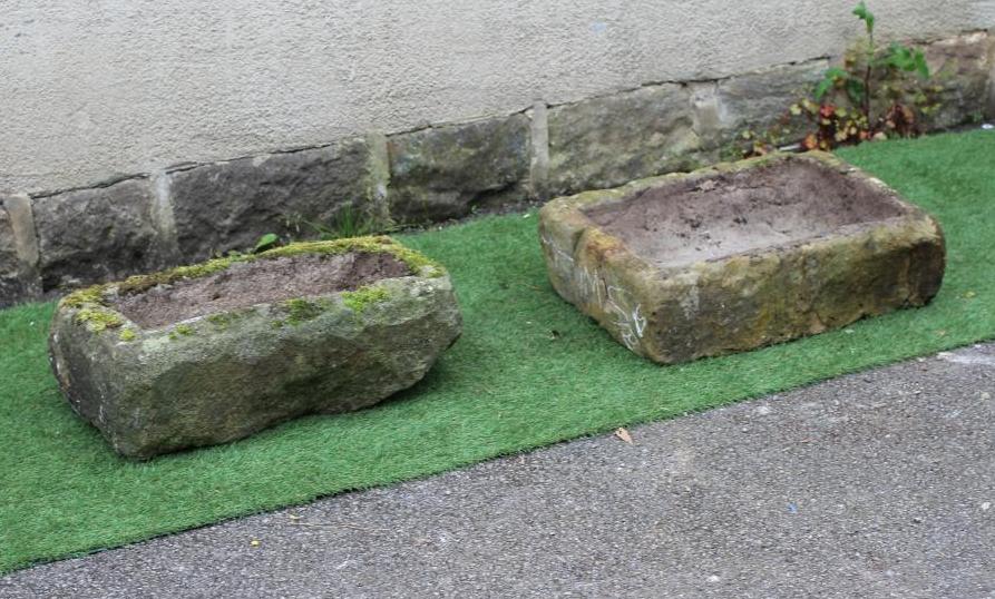 TWO SANDSTONE TROUGHS of rough hewn oblong form, 26" x 13 1/2" x 7" and 25" x 18 1/2" x 6 1/2" (2) Image