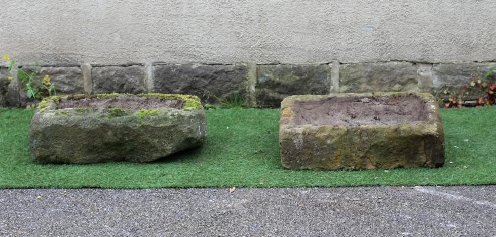 TWO SANDSTONE TROUGHS of rough hewn oblong form, 26" x 13 1/2" x 7" and 25" x 18 1/2" x 6 1/2" (2) Image