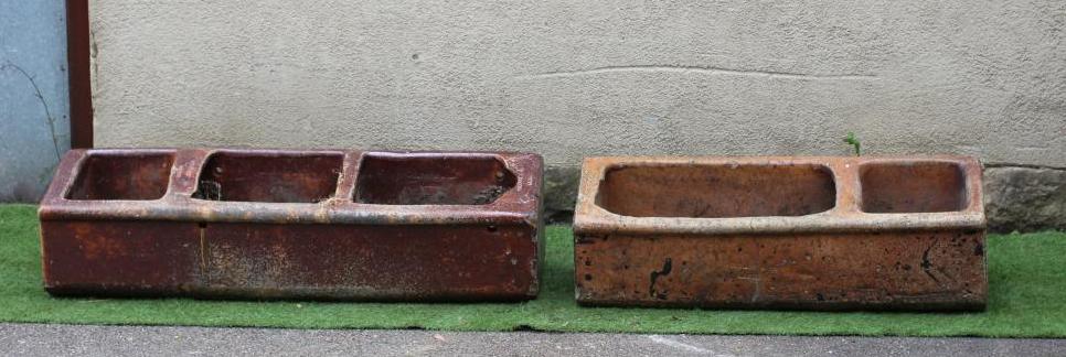 A LARGE SALT GLAZED FEEDING TROUGH of oblong form with three divisions Image