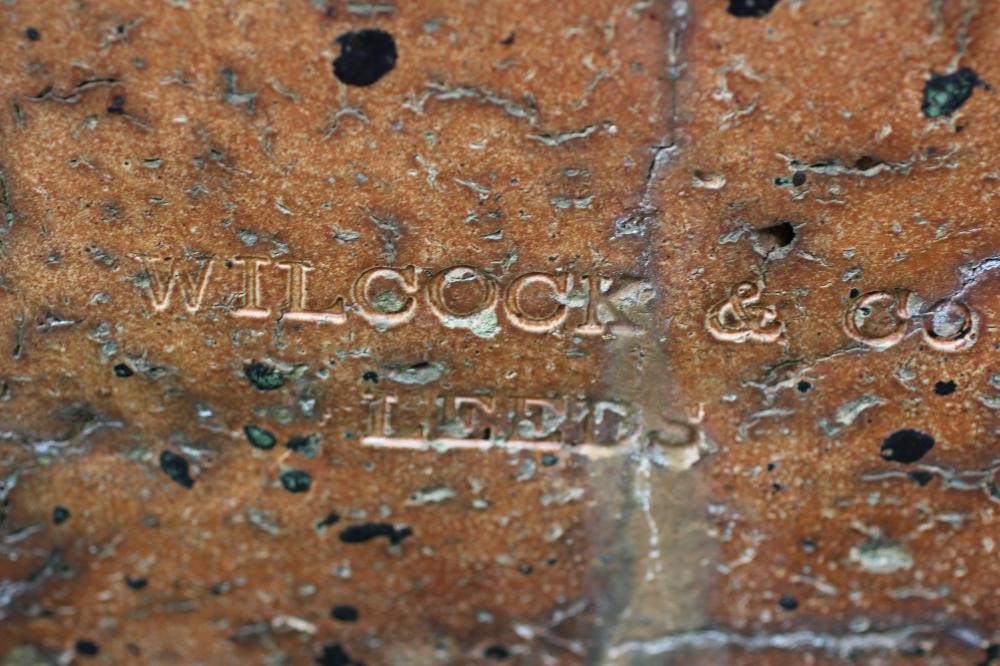 A LARGE SALT GLAZED FEEDING TROUGH of oblong form with three divisions Image