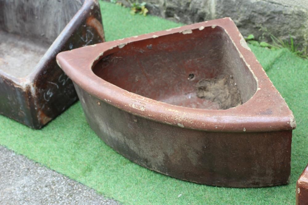 A PAIR OF SALT GLAZED FEEDING TROUGHS of sloping oblong form by The Leeds Fireclay Company Image