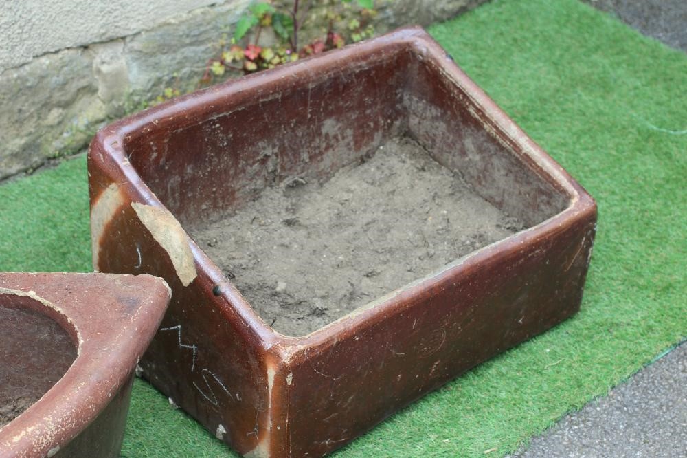 A PAIR OF SALT GLAZED FEEDING TROUGHS of sloping oblong form by The Leeds Fireclay Company Image