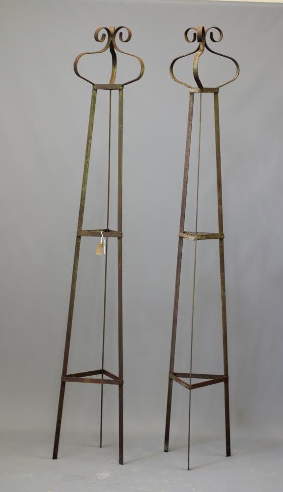 A PAIR OF HAND FORGED WROUGHT IRON OBELISKS of triangular section with scrolled finials, 90 3/4" Image