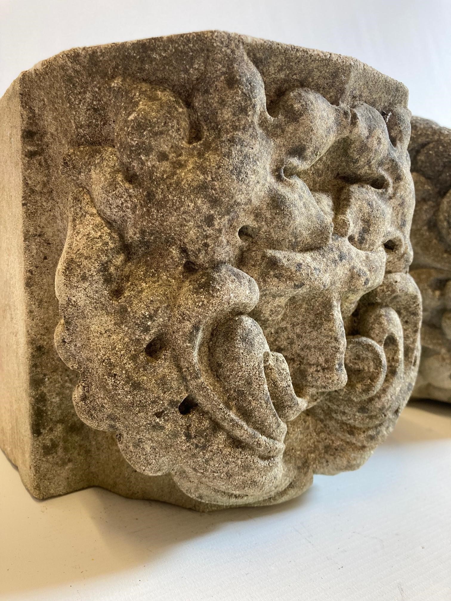 A MATCHED PAIR OF CAST STONE GREEN MAN CORBELS, 8" x 8" x 8" approximately (Est. plus 24% premium Image