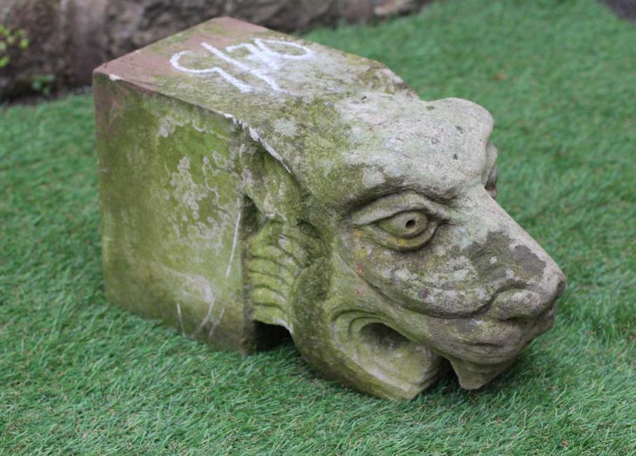 A CARVED SANDSTONE GARGOYLE modelled as a mythical beast, 15" x 6" (Est. plus 24% premium inc. VAT) Image
