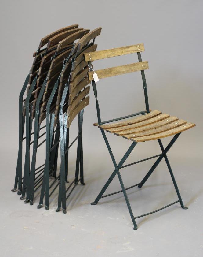 A SET OF SIX FRENCH BISTRO FOLDING CHAIRS of usual form, the painted metal frame with slatted wood Image