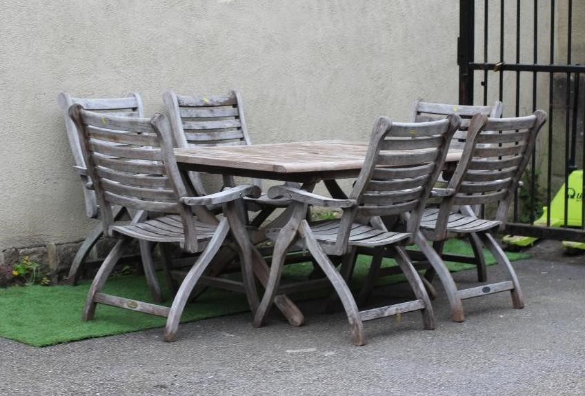 AN ALEXANDER ROSE TEAK DINING SUITE Image