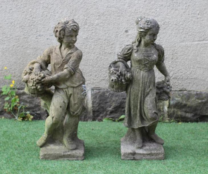 A PAIR OF CAST STONE ALLEGORICAL FIGURES of Summer and Autumn, raised on oblong base, 30" high (Est. Image