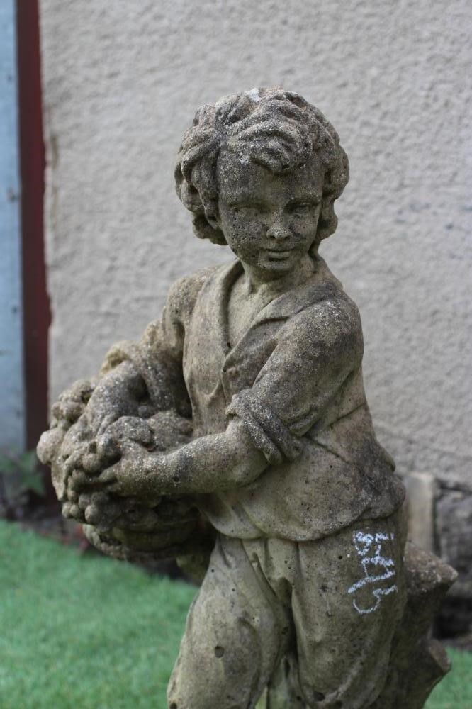 A PAIR OF CAST STONE ALLEGORICAL FIGURES of Summer and Autumn, raised on oblong base, 30" high (Est. Image