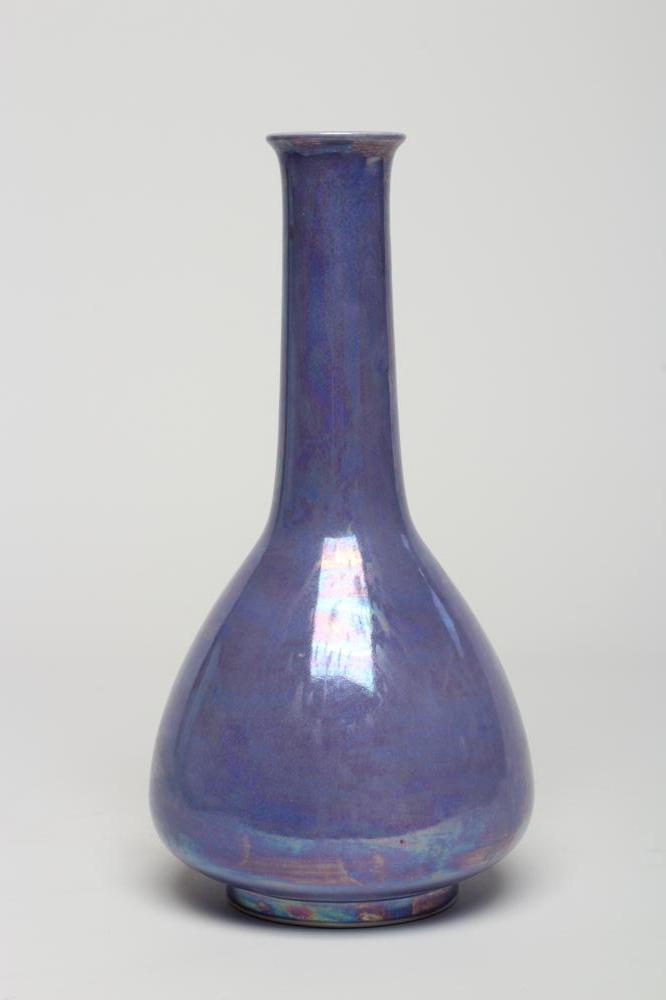 A RUSKIN POTTERY LILAC LUSTRE GLAZED BOTTLE VASE, 1910, impressed mark and date, 11" high (Est. plus Image