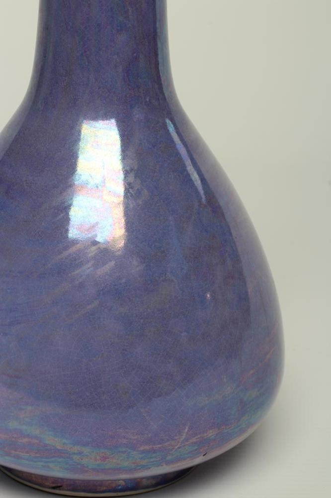 A RUSKIN POTTERY LILAC LUSTRE GLAZED BOTTLE VASE, 1910, impressed mark and date, 11" high (Est. plus Image