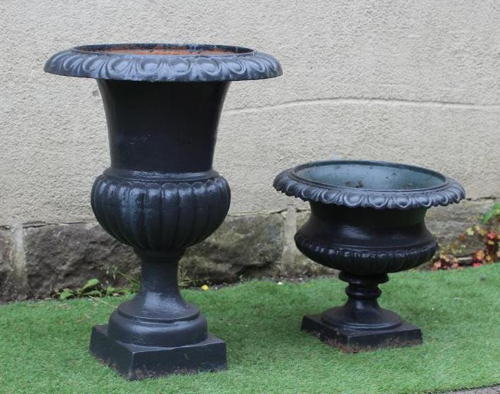 A LARGE CAST IRON URN of half fluted campana form with square base, 22" wide, 31" high, together Image