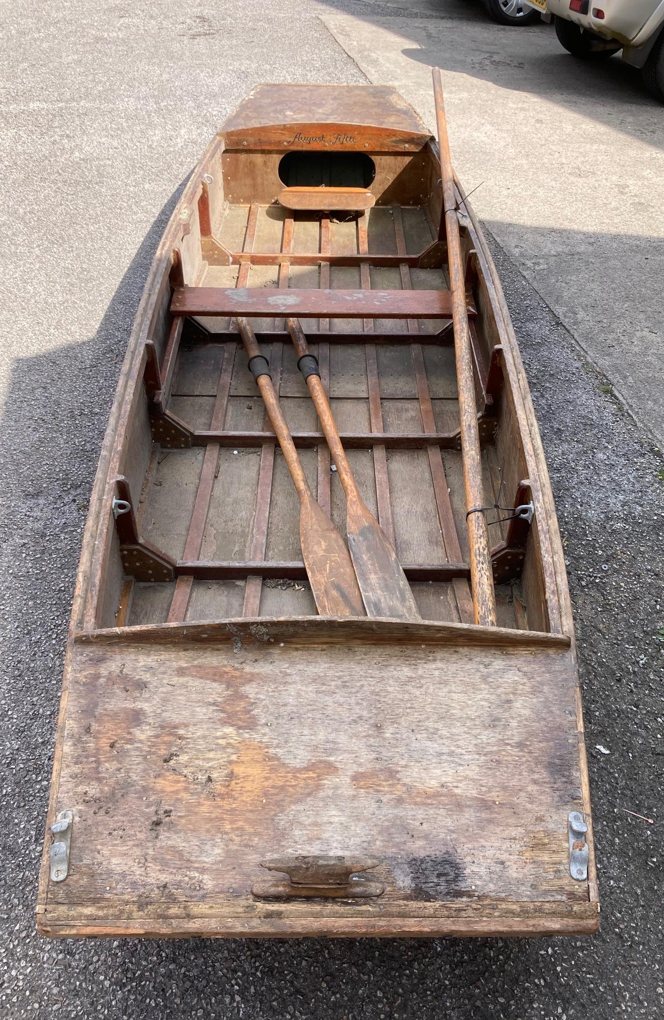 A MARINE PLYWOOD PUNT, "August Fifth", Image