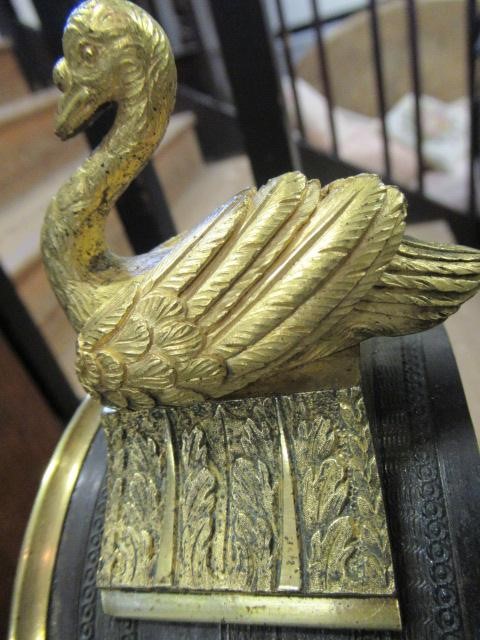 A FRENCH GILT AND PATINATED BRONZE MANTEL CLOCK BY BREGUET Image