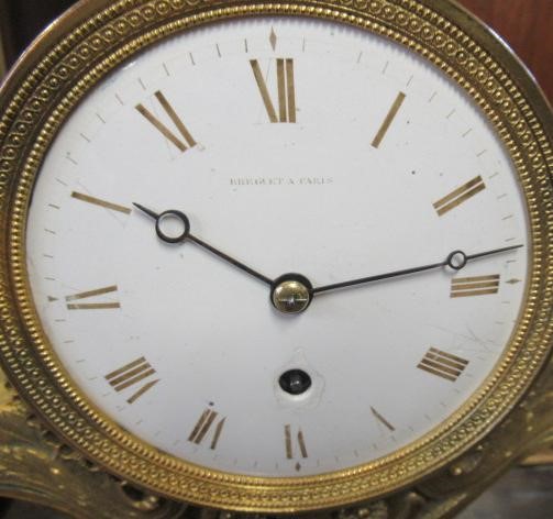 A FRENCH GILT AND PATINATED BRONZE MANTEL CLOCK BY BREGUET Image