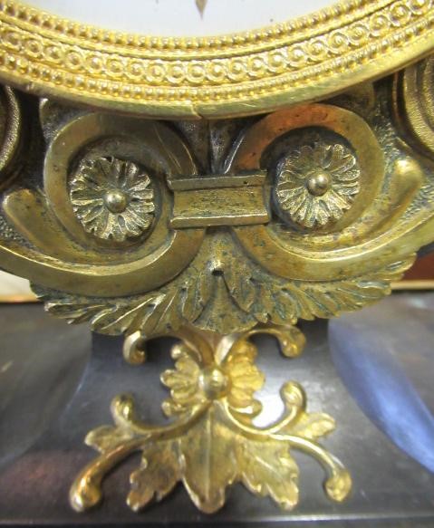 A FRENCH GILT AND PATINATED BRONZE MANTEL CLOCK BY BREGUET Image