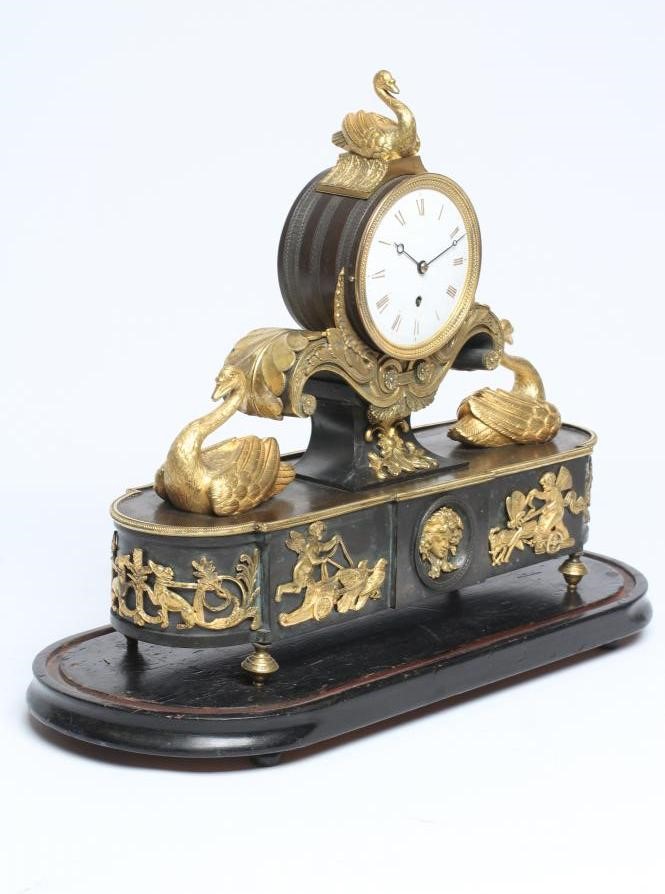 A FRENCH GILT AND PATINATED BRONZE MANTEL CLOCK BY BREGUET Image