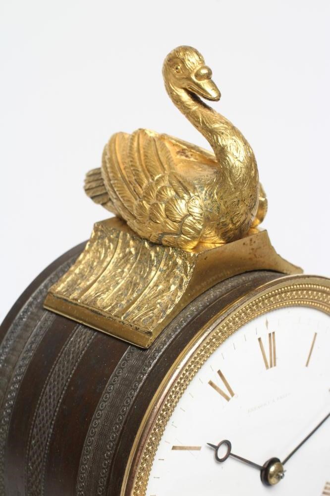 A FRENCH GILT AND PATINATED BRONZE MANTEL CLOCK BY BREGUET Image